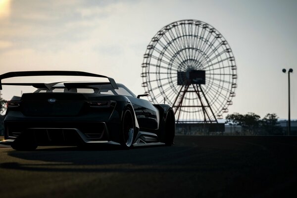 Subaru car on the background of the Ferris wheel