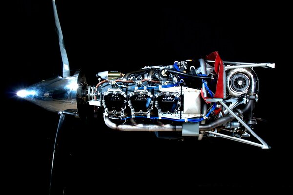 The engine from the plane on a black background