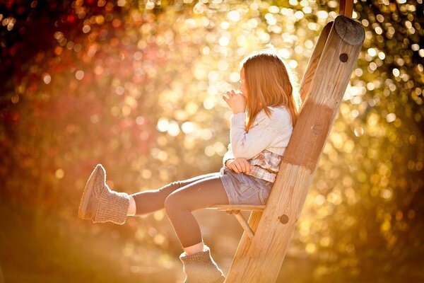 Bright photo of a girl at the stairs