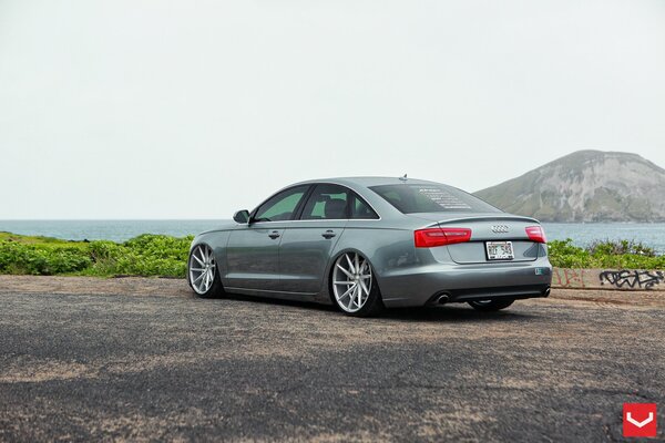 Audi and mountains. Grey car
