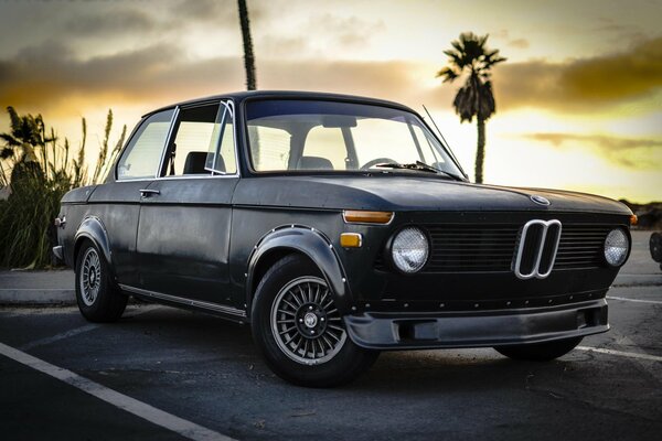 Classic BMW in vintage sunset