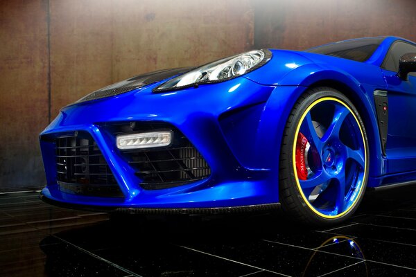 The car with turbo tuning is blue