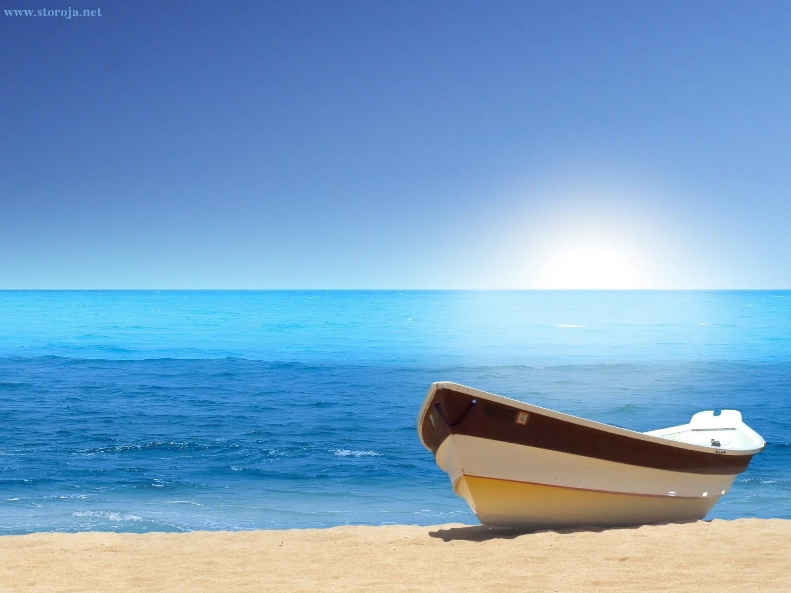 barco mar cielo sol