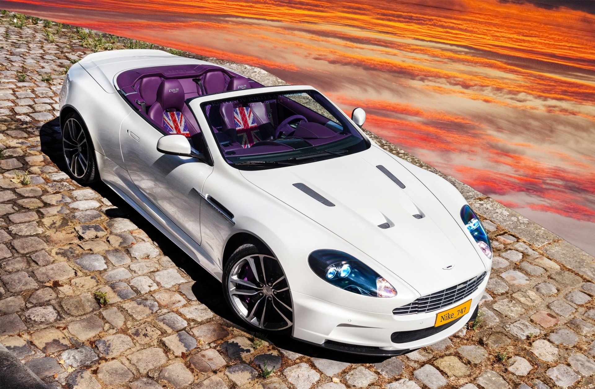 aston martin dbs двухместный автомобиль-купе агрессивный внешний вид аэродинамический обвес кузова дополнительные воздухозаборники