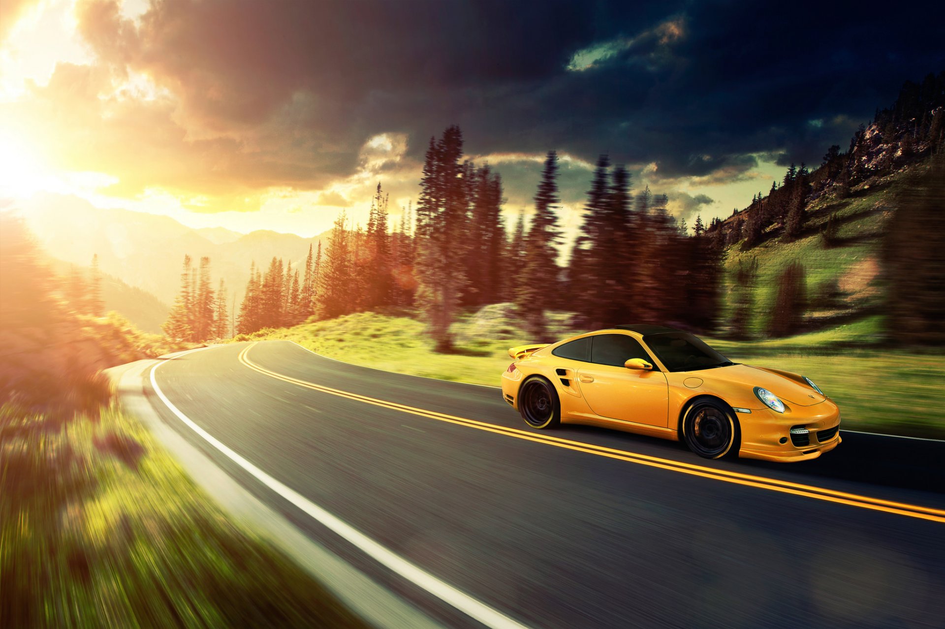 porsche 911 turbo amarillo ronaldo stewart porsche montañas sol