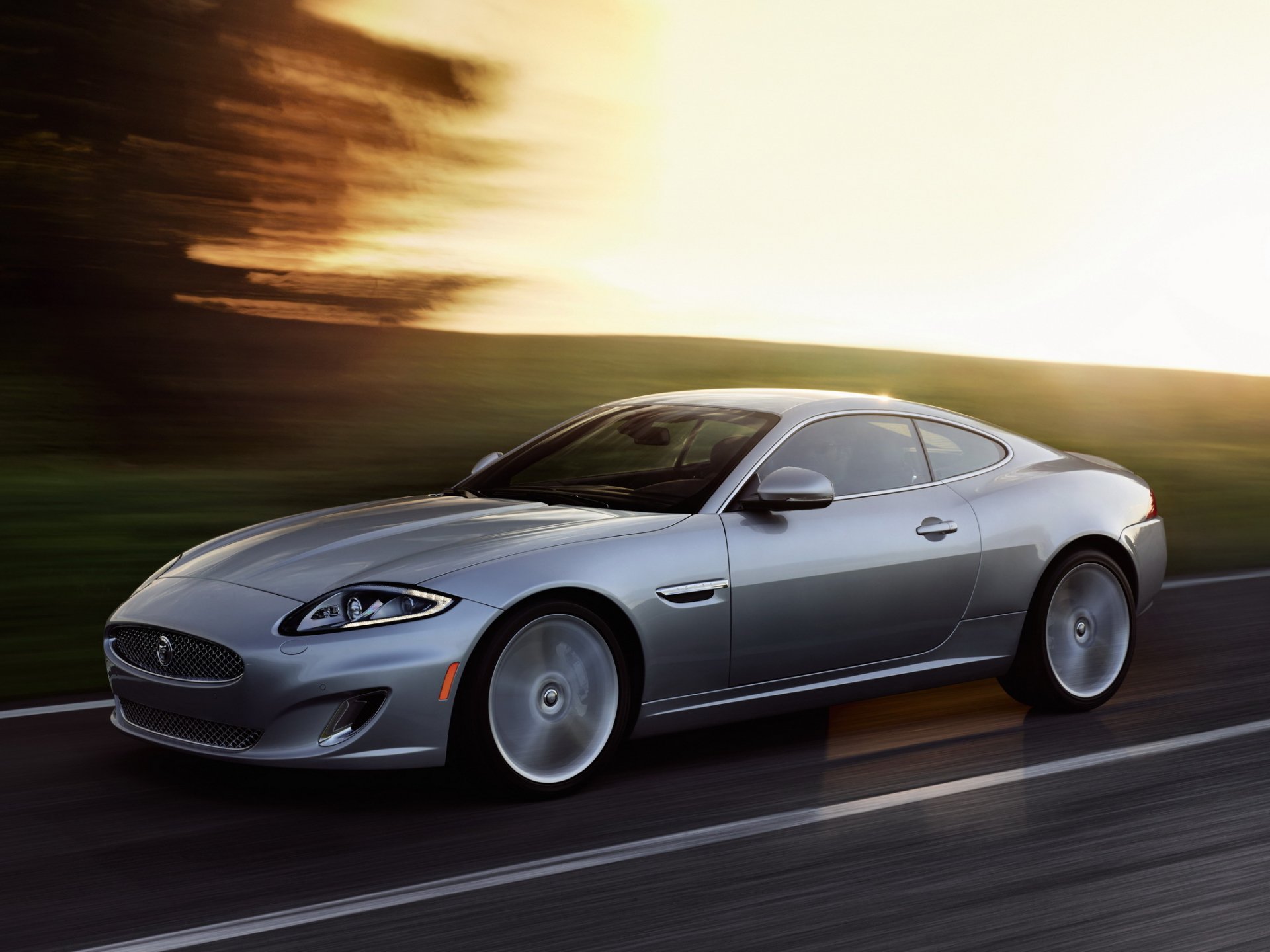 automobile macchina jaguar coupé grigio traffico strada jaguar xk argento
