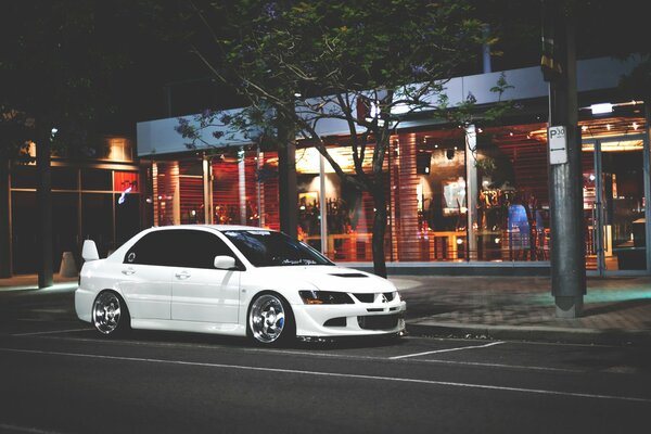 White Mitsubishi on the streets of the city