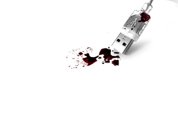 De l usb qui coule du sang sur fond blanc