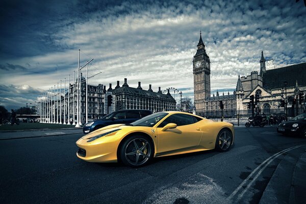 Yellow Ferrari on the background of London big Ben