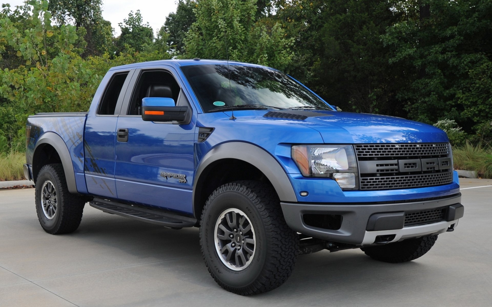 ford f-150 svt raptor supertaxi f-150 raptor pickup jeep suv blu anteriore alberi sfondo