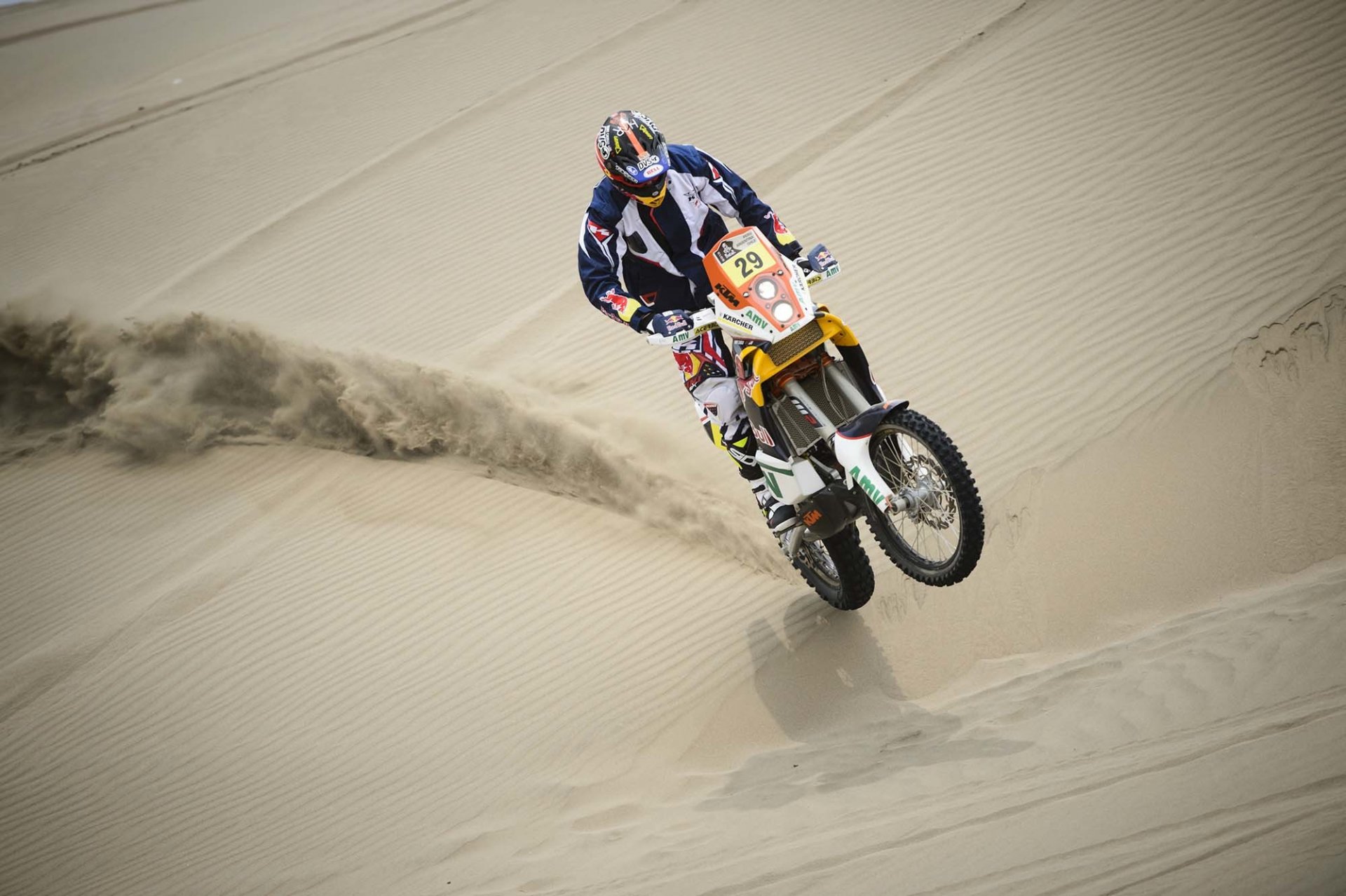 moto coureur sable dakar rallye course