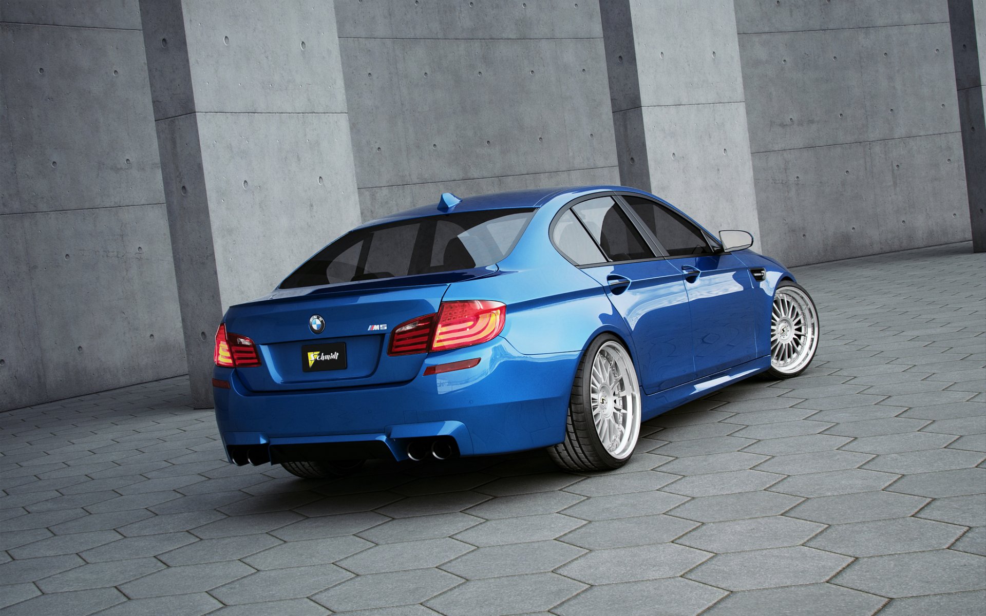 bmw m5 f10 blau bmw rückansicht graue pflastersteine schwarzes nummernschild