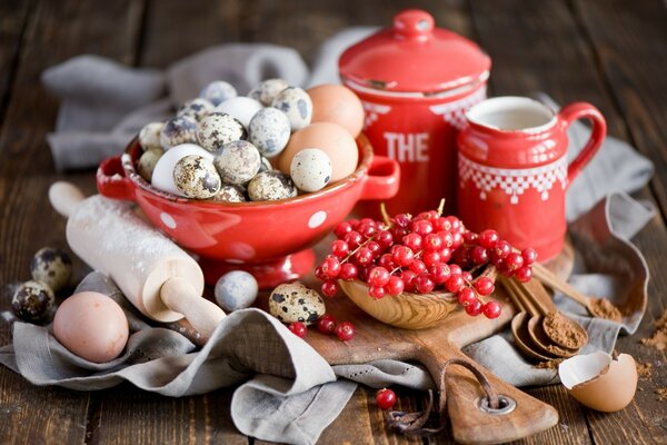 Cozy serving of tea, berries, eggs