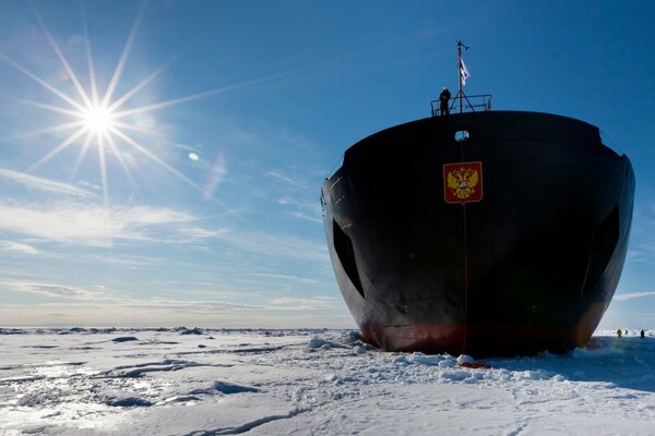 Nuclear icebreaker with a coat of arms in the Arctic