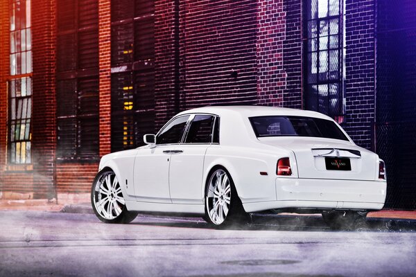 Rolls Royce Phantom car on the street rear view