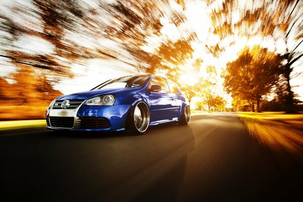 Volkswagen Golf blue in motion