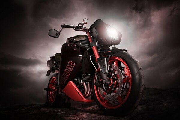 Motorcycle triple red on a dark background