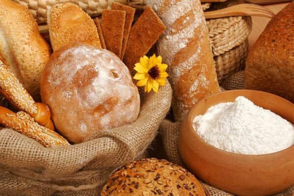 Fresh pastries in bags and baskets