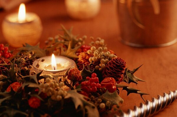 Warm candles for Christmas on the table