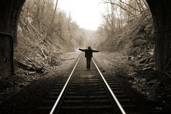 Rails to nowhere. Tunnel in the mountains