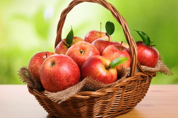 Wicker basket with ripe apples