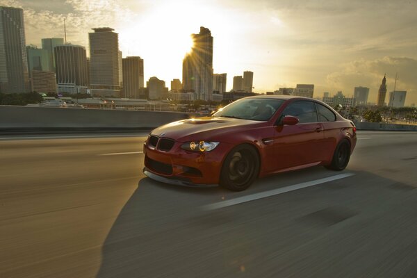 In the morning dawn, a powerful car