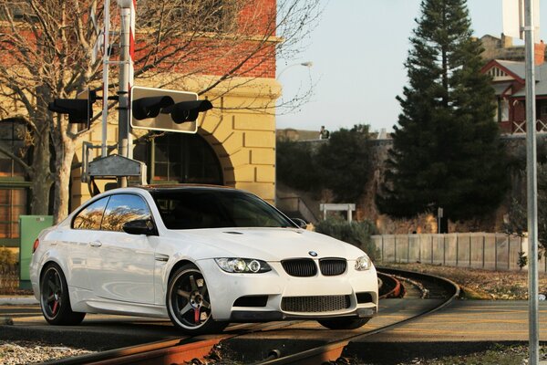 Bmw on the city s railway tracks