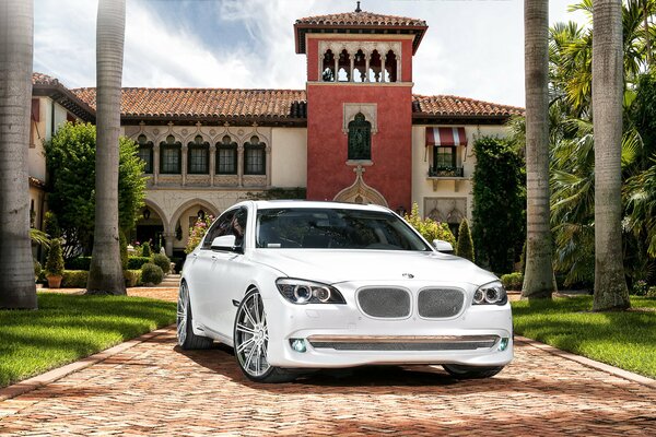 Tuned BMW seven on a beautiful background