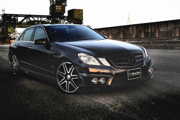 Beautiful black Mercedes e-class. Picture on wallpaper