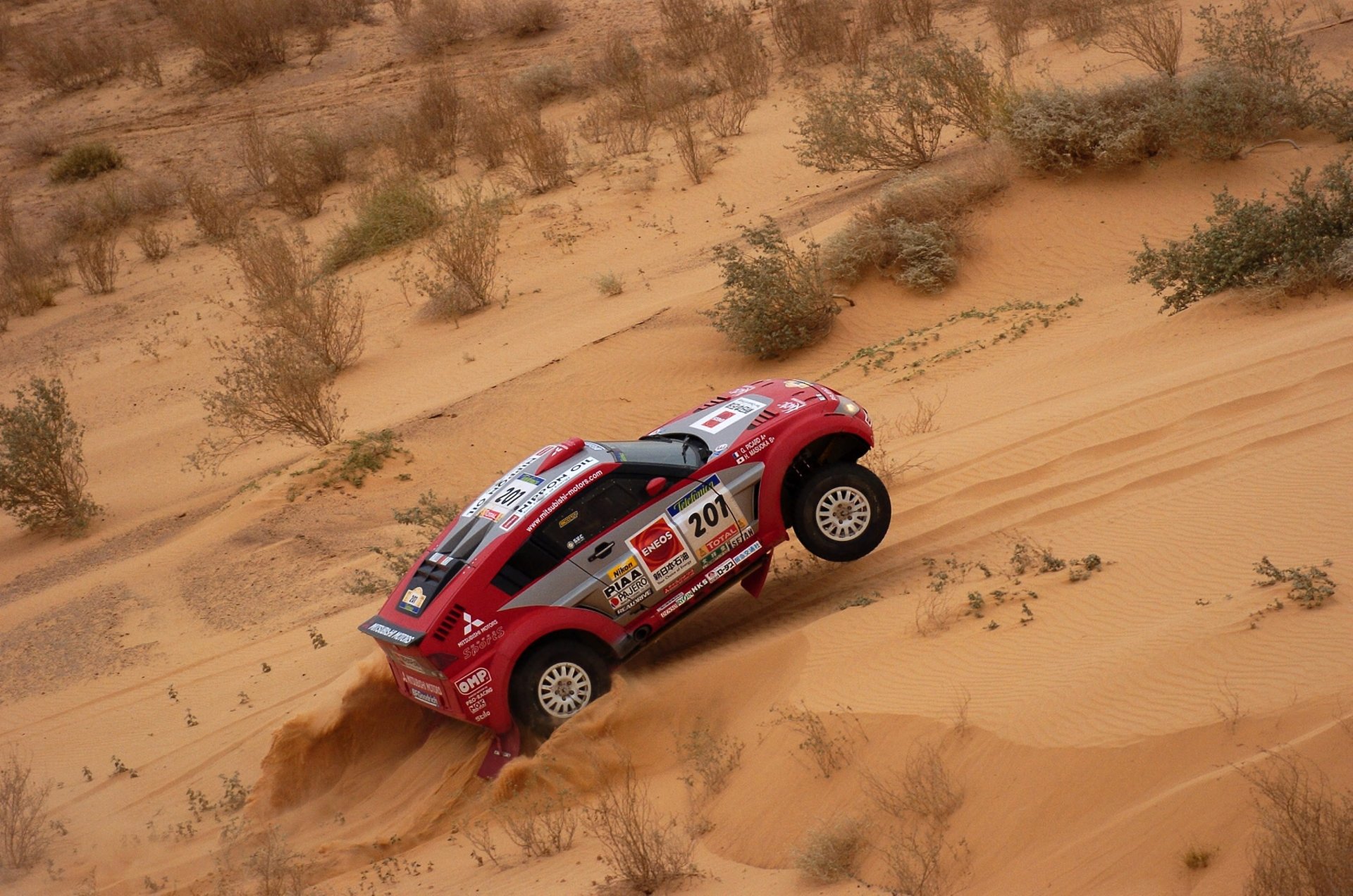 mitsubishi dakar rally race rally sport car sand auto suv red