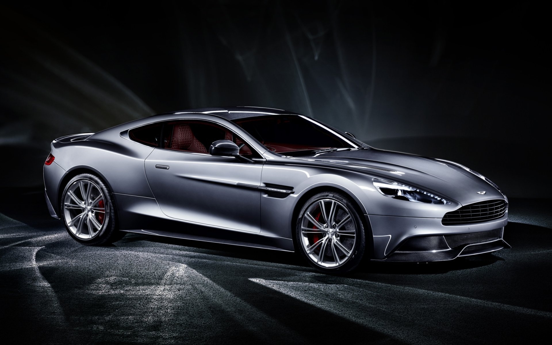 aston martin vanquish aston martin vancouver supersamochód szary przód zmierzch tło