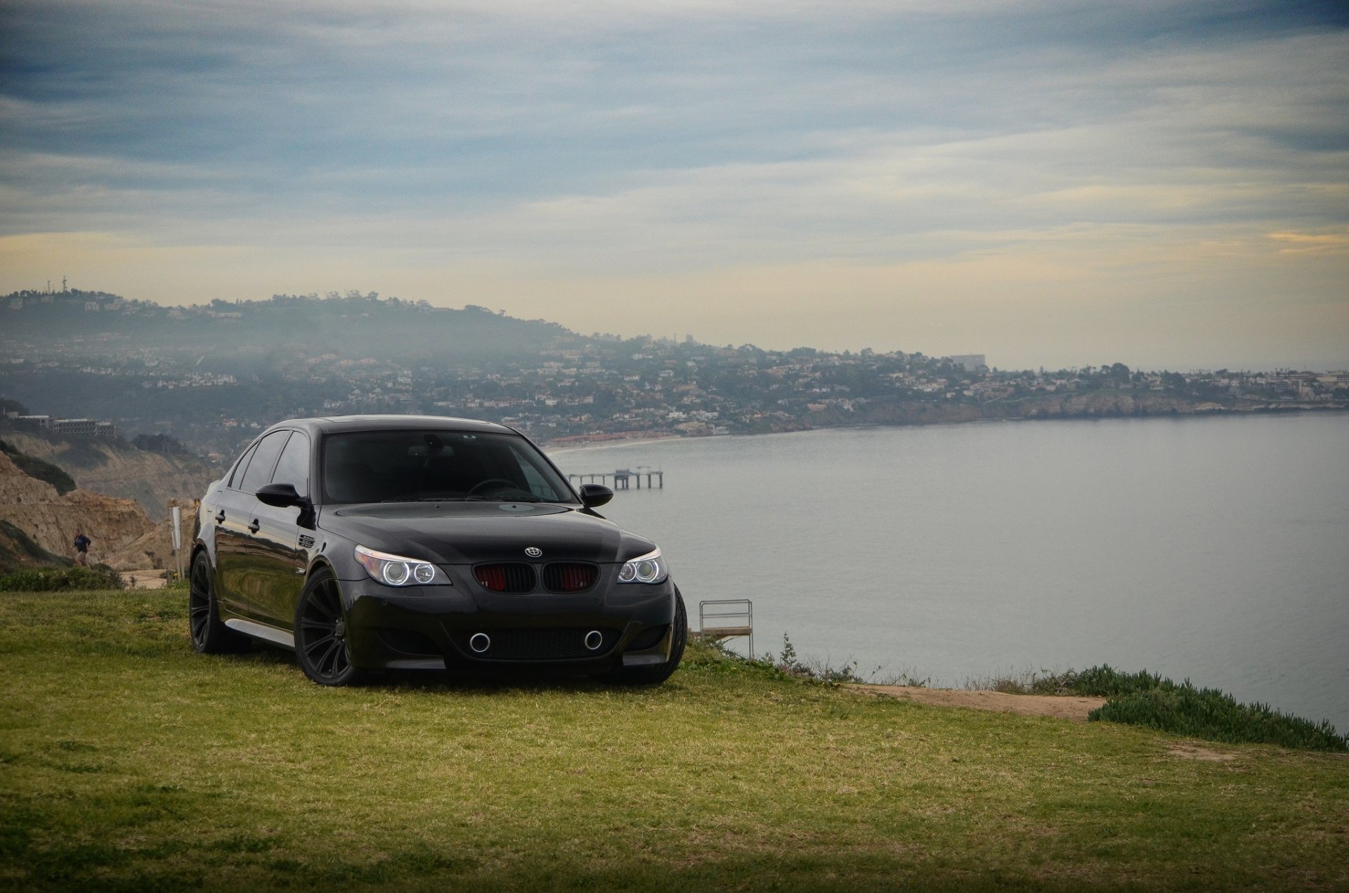 bmw m5 e60 black bmw sedan tuning front view slope sea sky cloud