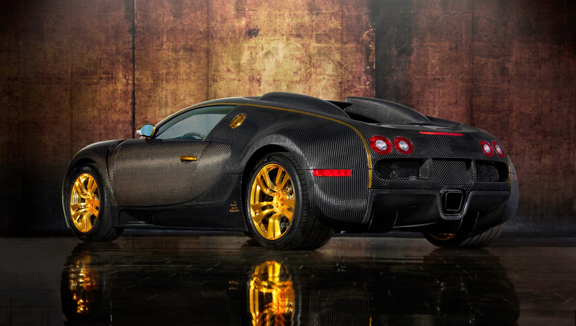 bugatti veyron 16.4 linea vincero d oro mansory auto bugatti veyron auto sportiva carrozzeria carbonio oro design riflessione