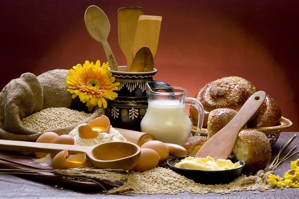 Table with bread flowers and grain