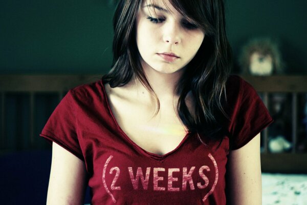 Sad girl in a T-shirt which is amazing