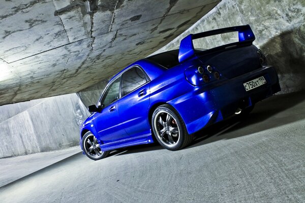 Blue Subaru impreza sports car