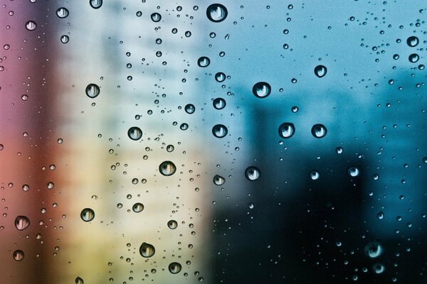 Colored texture of water droplets on glass