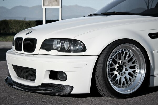 Tuned white BMW with body kit