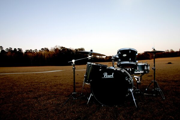 Drum kit in an empty field