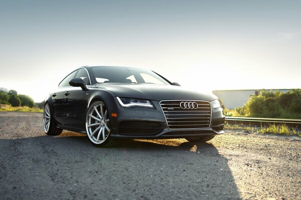Photographie d Audi sur fond de beau paysage
