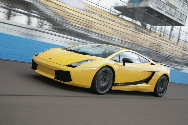 Yellow Lamborghini Gallardo is an Italian brand of car on the road