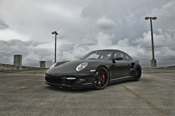 In the clouds among the lanterns on the road Porsche Carrera