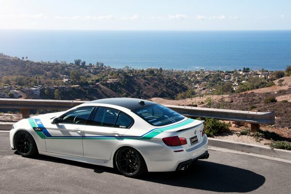 A car on a mountain road near a bump