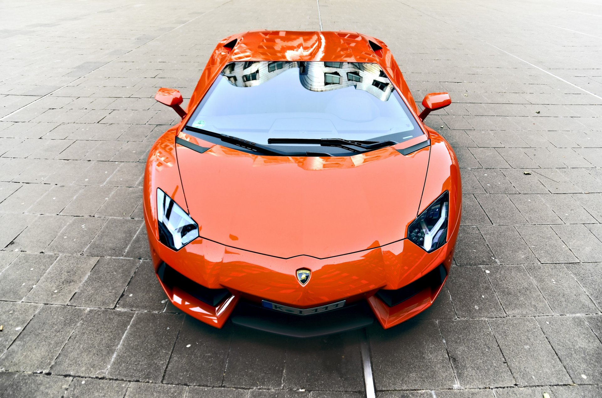 lamborghini aventador lp700-4 naranja lamborghini aventador frente reflexión adoquines