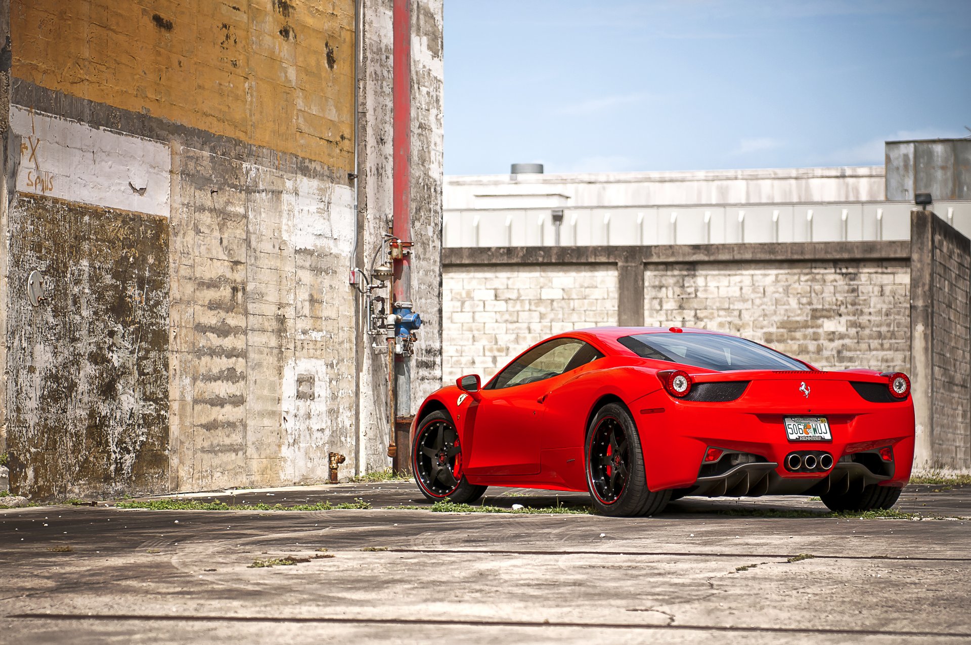 ferrari 458 italia red black wheels sky clouds ferrari italy red wall pipe brick fence