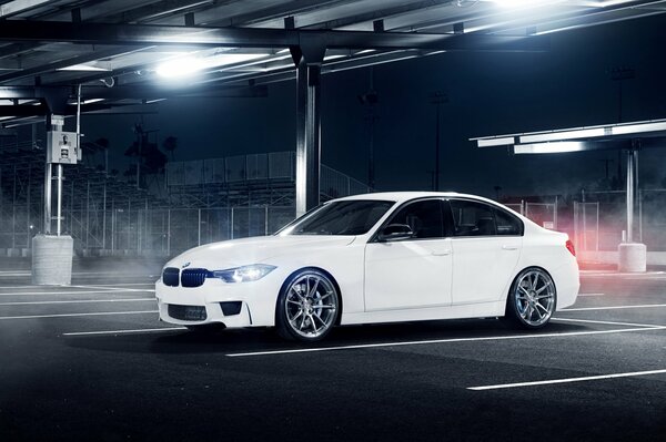 White BMW in the parking lot