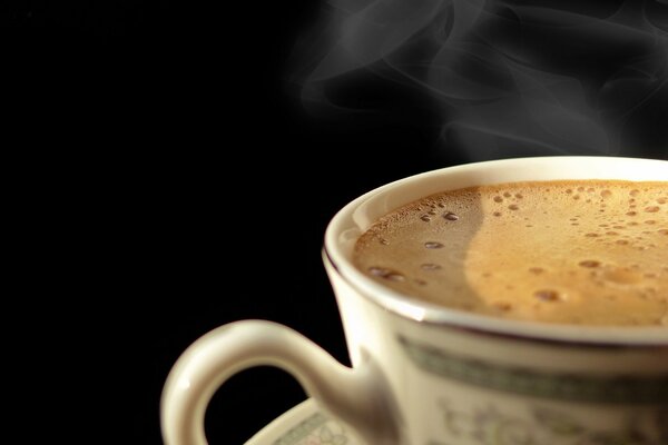 Hot cup of fragrant coffee