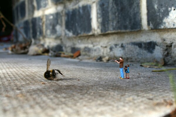 Little men vs big wasp