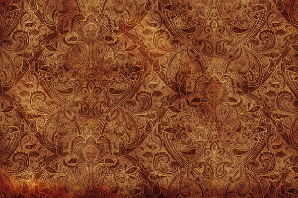 Ornamental pattern on a brown background