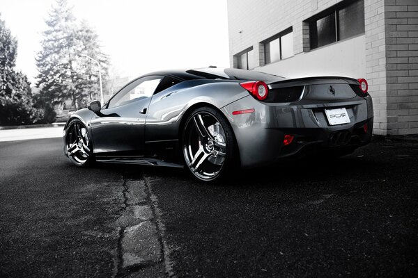 Ferrari silvery in the city center